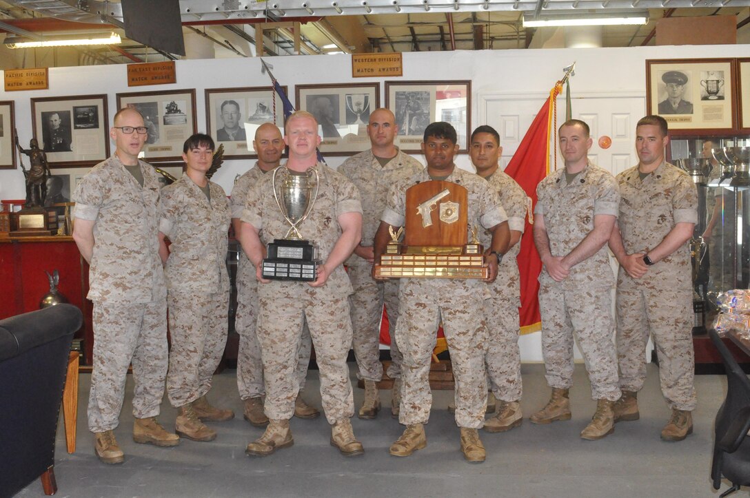 Members of the championship rifle and pitol teams are Lt. Col. Daniel Scott, Capt. Ashley McCabe, Chief Warrant Officer 5 Vince Pope, Capt. Shawn Malone, Chief Warrant Officer 4 Paul Sandy, Gt. Neil Sookdeo, Gunnery Sgt. Israel Gonzales, Gunnery Sgt. Larry King and Sgt. John Paszkiet.