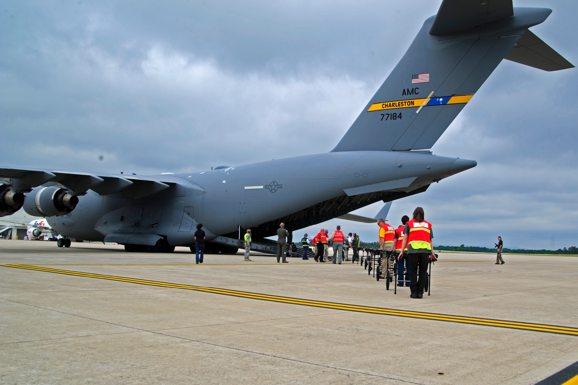 Members of the 315th Aeromedical Evacuation Squadron conduct training operations with the support from Civil Air Patrol volunteers onboard a C-17 Globemaster III, assigned to the 300th Airlift Squadron, near Joint Base Charleston, S.C., May 18, 2016. The squadrons conducted the training to enhance their ability to receive, regulate, transport and track patients to and from Natural Disaster Medical System hospitals near Greenville-Spartanburg International Airport. (U.S. Air Force photo by Senior Airman Jonathan Lane)