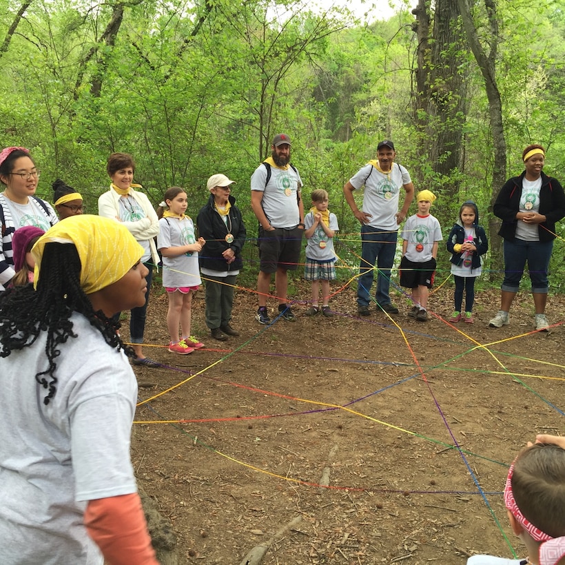 Big buddies and little buddies participate in the yarn toss in which a buddy throws a ball of rainbow-colored yarn across the circle while holding one end.  When the yarn is caught, the person tells how their loved one died and who they are to them.  Once everyone has caught the yarn ball it forms a spider web-like configuration, signifying the chaos of loss and the many emotions felt during grief symbolized by the many colors.
