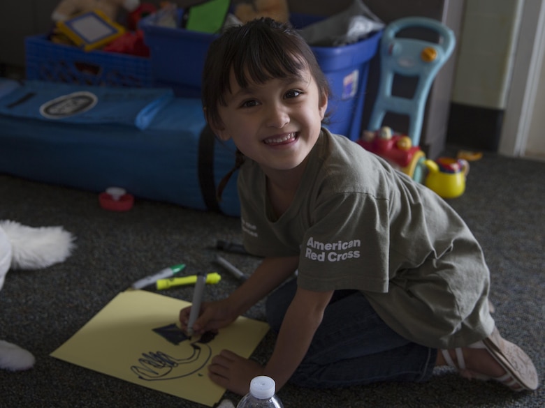 Jessica Gold, 4, club member, draws a picture during the American Red Cross Youth Club’s Homework Helper Club May 5, 2016. The Homework Helper Club provides students with a supportive learning environment every Thursday at 5 p.m. (Official Marine Corps photo by Cpl. Connor Hancock/Released)