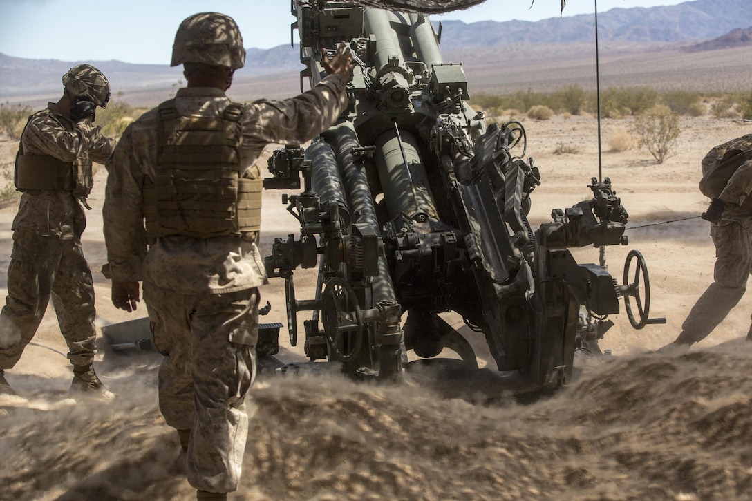 Marines with 3rd Battalion, 11th Marine Regiment, fire a 155mm M777A2 Lightweight Towed Howitzer in the Lead Mountain Training Area aboard the Marine Corps Air Ground Combat Center Twentynine Palms, Calif., May 3, 2016. (Official Marine Corps photo by Lance Cpl. Levi Schultz/Released)