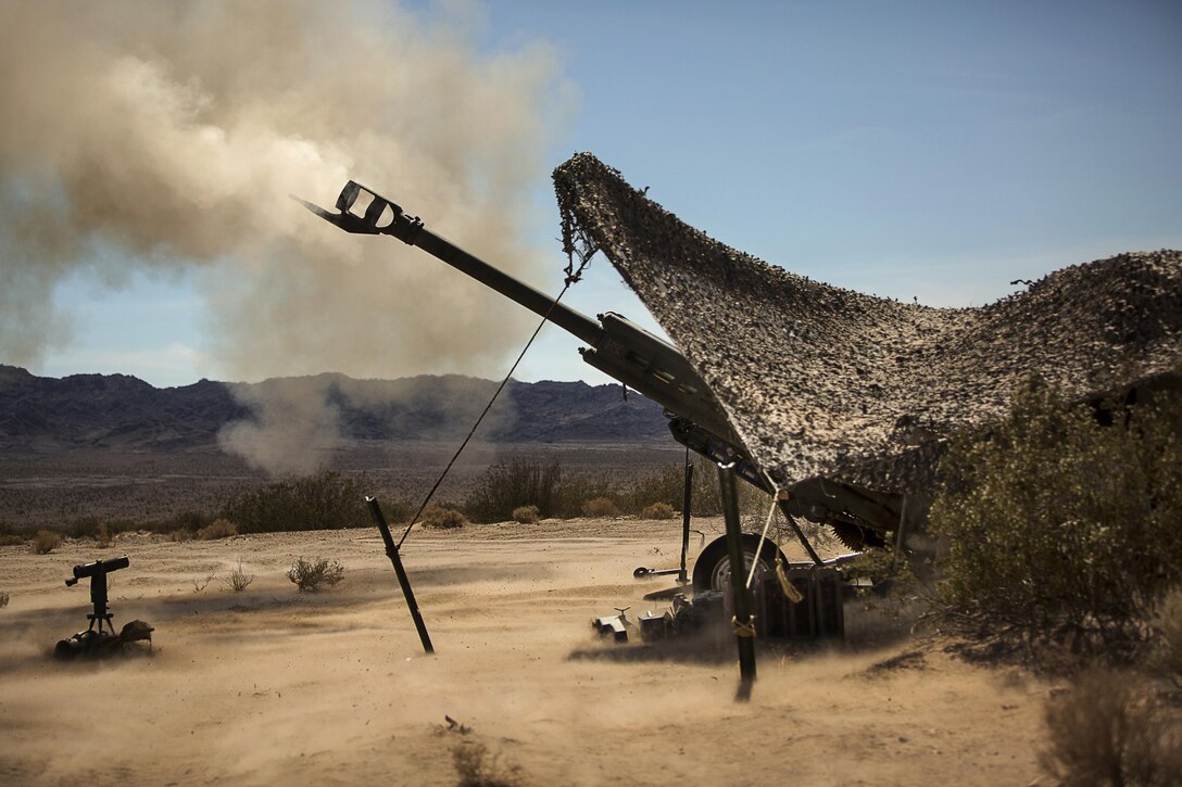 Marines with 3rd Battalion, 11th Marine Regiment, fire a 155mm M777A2 Lightweight Towed Howitzer in the Lead Mountain Training Area aboard the Marine Corps Air Ground Combat Center Twentynine Palms, Calif., May 3, 2016. (Official Marine Corps photo by Lance Cpl. Levi Schultz/Released)