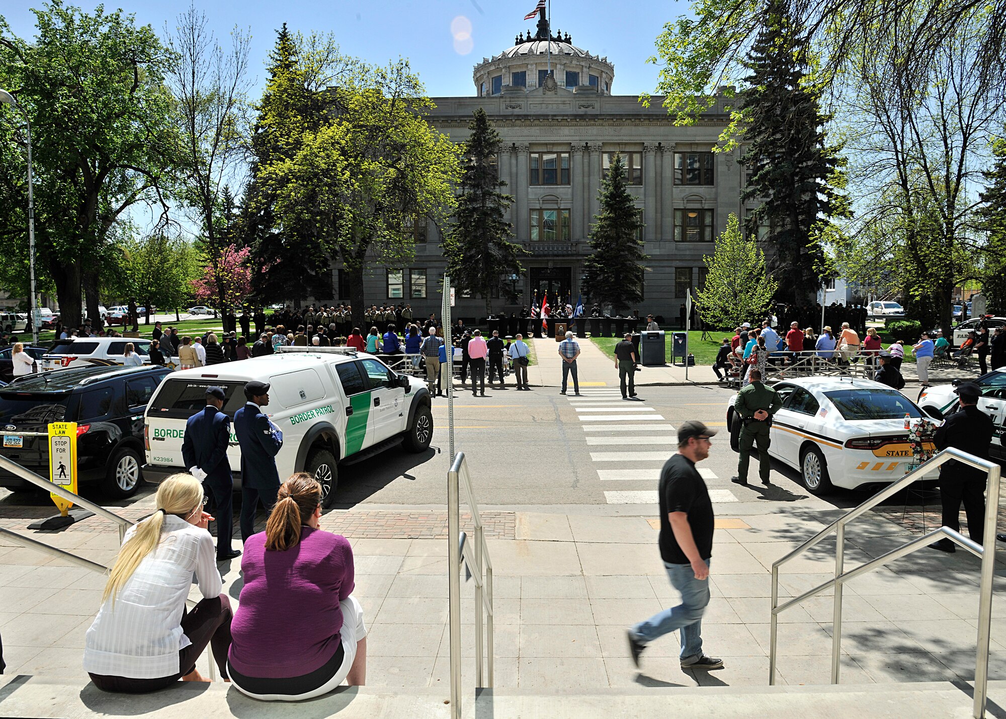 Attendants watch the National Police Week Memorial Service at Grand Forks County Court House May 17, 2016, in Grand Forks, N.D. The memorial service honored 35 local police officers who sacrificed their lives in the line of duty. (U.S. Air Force photo/Senior Airman Xavier Navarro)