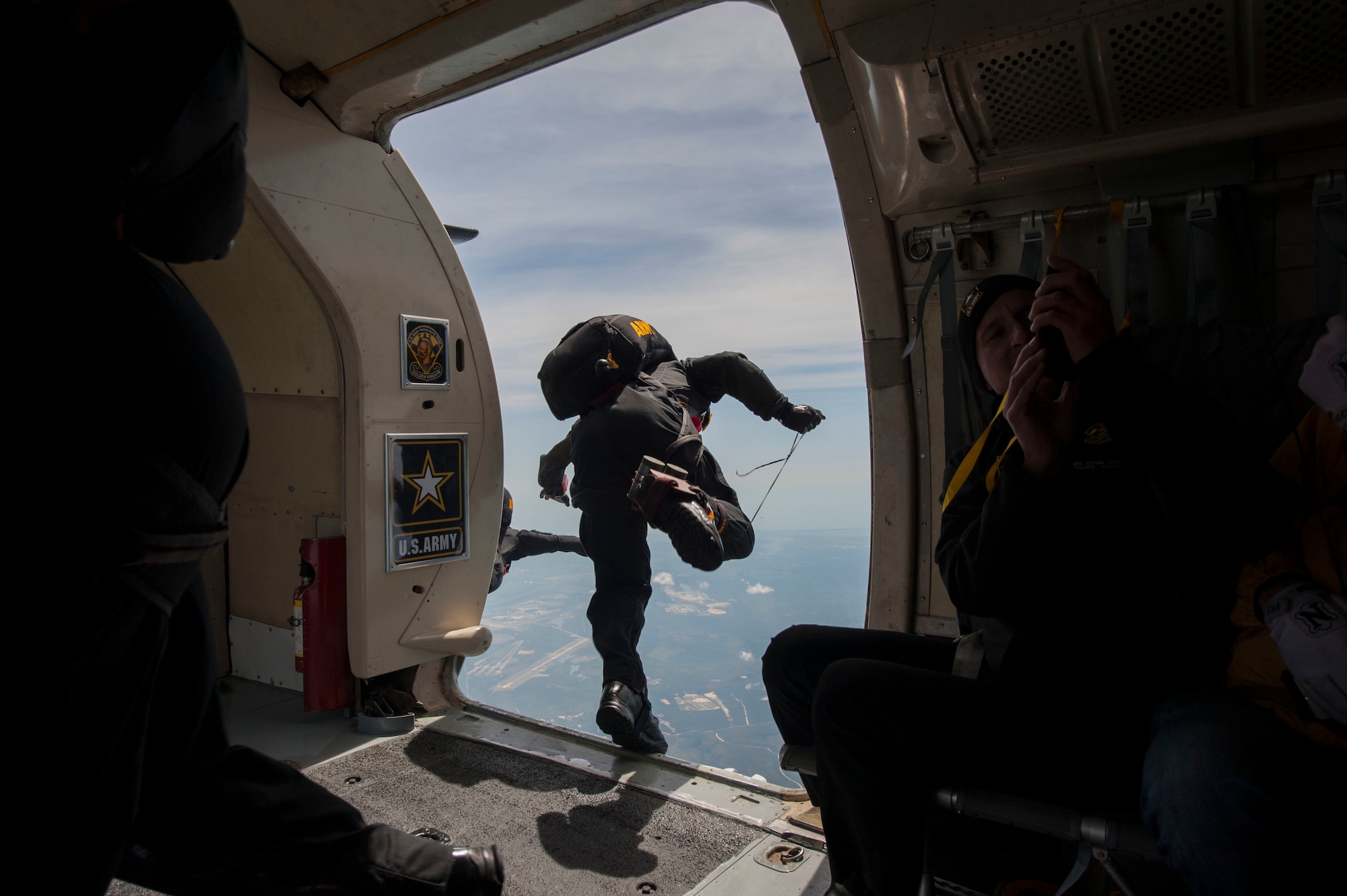 The U.S. Army Golden Knights parachute to open up the Power in the Pines Open House and Air Show at Joint Base McGuire-Dix-Lakehursst, N.J. May 14. As the nation’s only tri-service joint base, JB MDL’s Power in the Pines Open House and Air Show boasts  demonstrations from each branch of the armed forces. (U.S. Air Force photo by Senior Airman Joshua King)