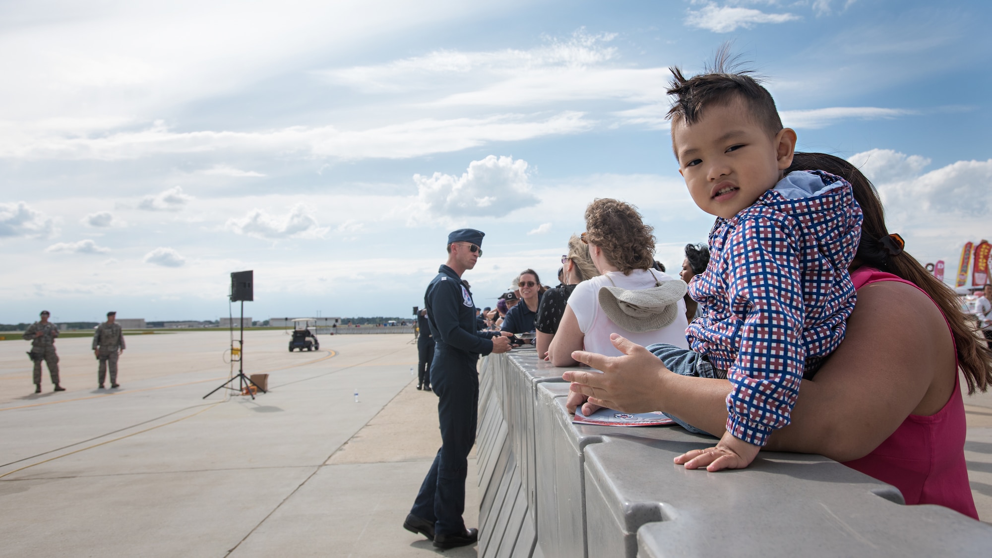 Audience members have autographs signed, pictures taken and questions answered during the 2018 Power in the Pines Open House and Air Show at Joint Base McGuire-Dix-Lakehurst, N.J. May 14, 2015. Approximately 375,000 spectators visited JB MDL to see the might of the armed forces in action at the show. (U.S. Air Force photo by Staff Sgt. Katherine Tereyama)