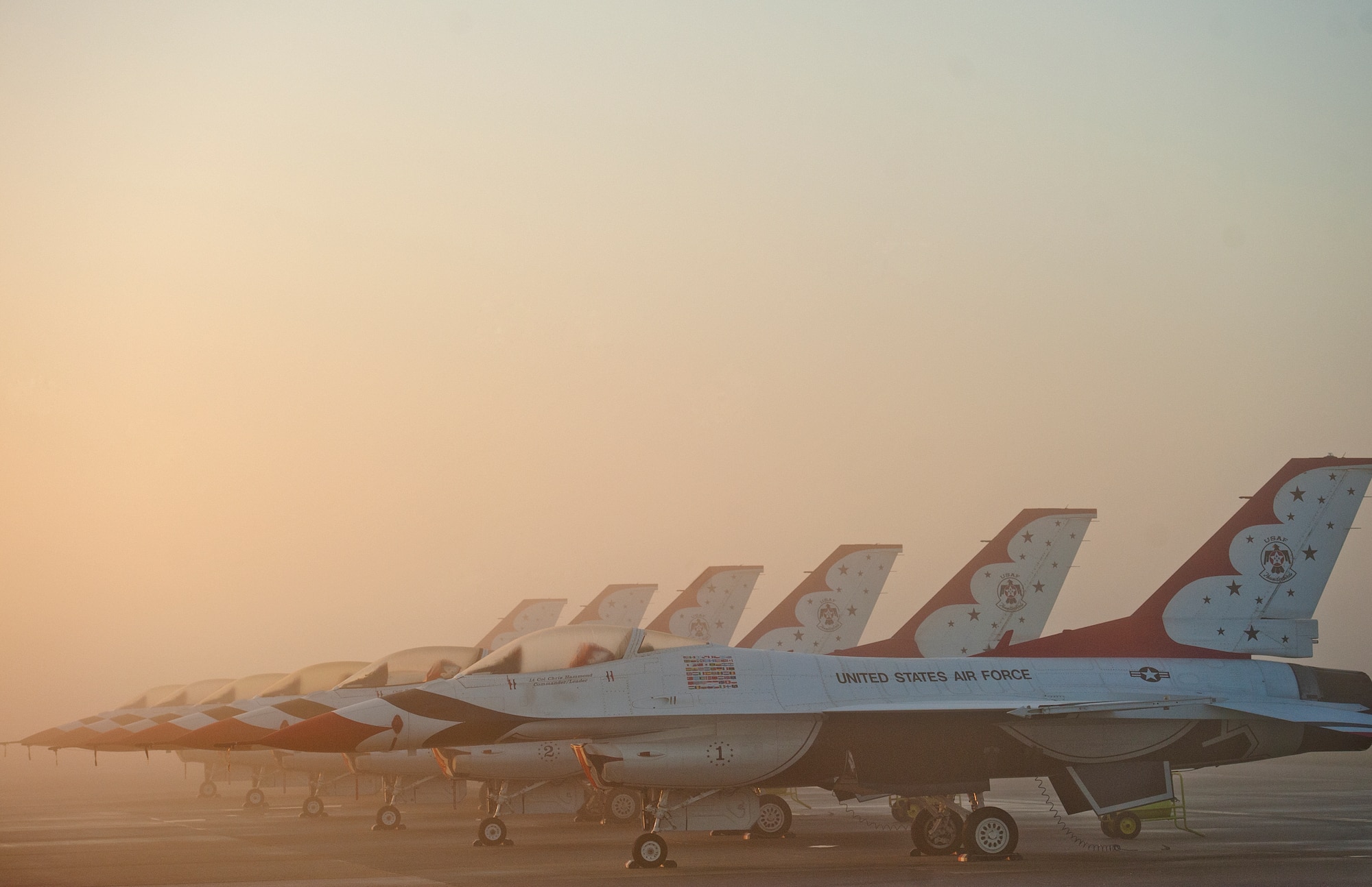 U.S. Air Force F-16C Flighting Falcons assigned to the U.S. Air Force Demonstration Team, The Thunderbirds, sit in the fog at Joint Base McGuire-Dix-Lakehurst, N.J., the morning of the Power in the Pines Open House and Air Show. As the nation???s only tri-service joint base, JB MDL???s Power in the Pines Open House and Air Show boasts demonstrations from each branch of the armed forces. (U.S. Air Force by Christian DeLuca/Released)