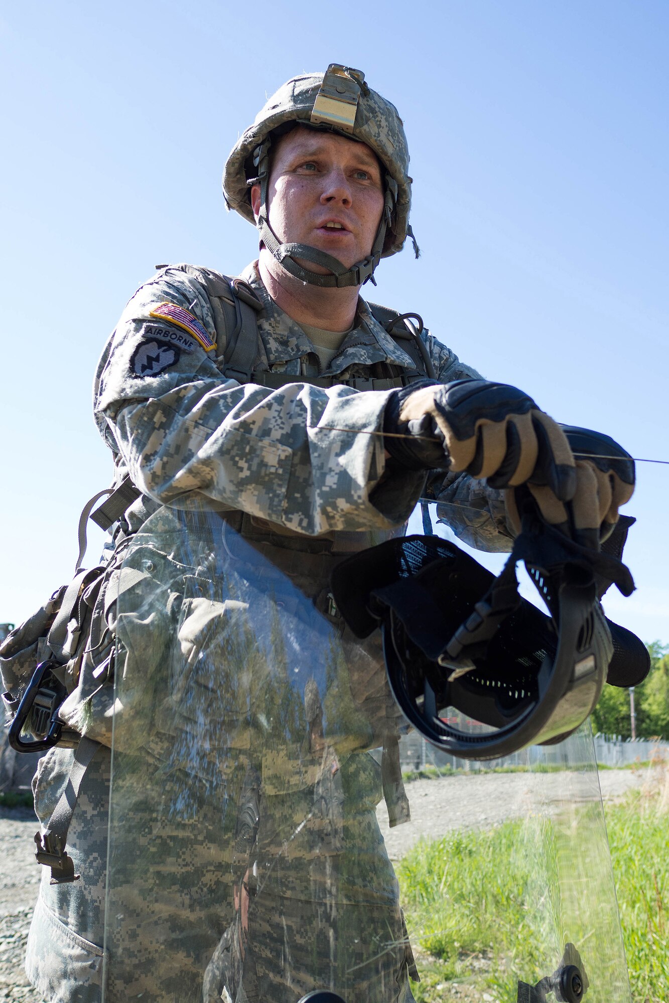 Alaska Army National Guard Staff Sgt. Garrett Kirby, A Troop, 1st Squadron, 297th Cavalry Regiment, briefs Soldiers on safety procedures for an individual-movement techniques lane May 14, 2016, at the Alaska National Guard's Alcantra Armory in Wasilla. Soldiers used paint-marker training munitions to make the training more realistic. (U.S. Army National Guard photo by Sgt. David Bedard)