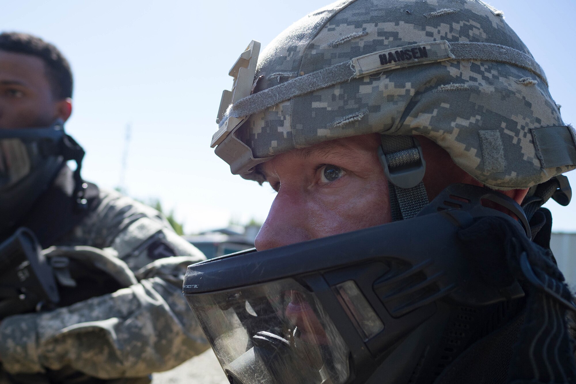 Alaska Army National Guard Spc. Allen Hansen, B Company, 1st Battalion (Airborne), 143rd Infantry Regiment, attends an after-action review following an individual-movement techniques lane May 14, 2016, at the Alaska National Guard's Alcantra Armory in Wasilla. During IMT, Soldiers provide covering fire, while a battle buddy bounds to cover. (U.S. Army National Guard photo by Sgt. David Bedard/Released)