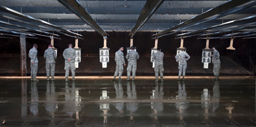 Airmen check their scores during the 2016 Elementary Level Excellence in Competition Rifle Match at Joint Base Andrews, Md., May 17. The EIC had 120 participants from active duty, the Guard and Reserve, and was one of several events on base celebrating National Police Week. (U.S. Air Force photo by Airman 1st Class Philip Bryant)