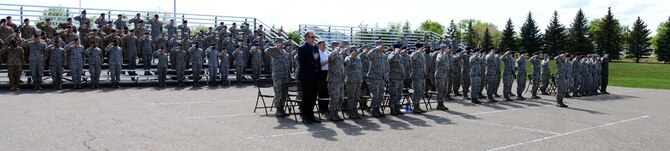 Members of the 341st Missile Wing salute during a retreat ceremony May 16, 2016, at Malmstrom Air Force Base, Mont. Malmstrom held the retreat to kick off National Police Week, which recognizes those in law enforcement who have made the ultimate sacrifice. There have been approximately 22,500 known deaths in the line of duty in the United States since 1791. (U.S. Air Force photo/Airman 1st Class Magen M. Reeves)
