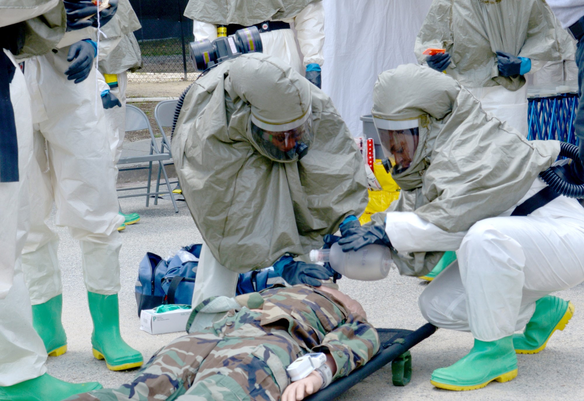Airmen from the 78th Medical Group recently participated in a three-day, In-Place Patient Decontamination specialized class that included classroom training and hands-on instruction on shelter assembly, setting up a containment system for wastewater runoff and processing, and patient care during a chemical, biological, radiological or nuclear incident. (U.S. Air Force photo by Ray Crayton)