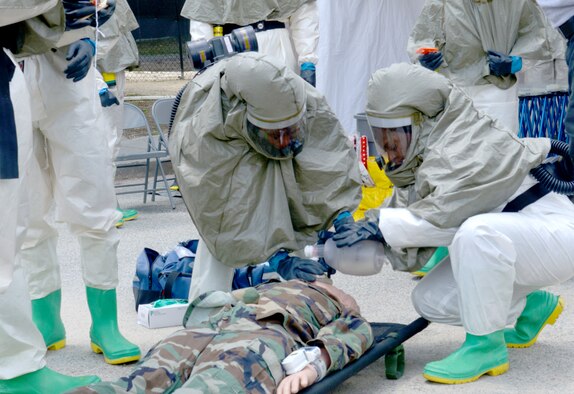 Airmen from the 78th Medical Group recently participated in a three-day, In-Place Patient Decontamination specialized class that included classroom training and hands-on instruction on shelter assembly, setting up a containment system for wastewater runoff and processing, and patient care during a chemical, biological, radiological or nuclear incident. (U.S. Air Force photo by Ray Crayton)