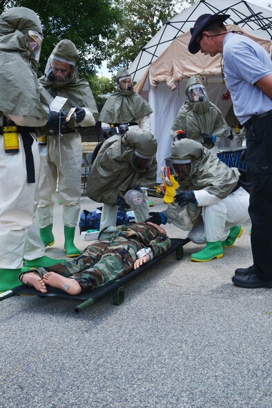 Airmen from the 78th Medical Group recently participated in a three-day, In-Place Patient Decontamination specialized class that included classroom training and hands-on instruction on shelter assembly, setting up a containment system for wastewater runoff and processing, and patient care during a chemical, biological, radiological or nuclear incident. (U.S. Air Force photo by Ray Crayton)