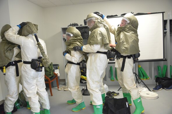 Airmen from the 78th Medical Group recently participated in a three-day, In-Place Patient Decontamination specialized class that included classroom training and hands-on instruction on shelter assembly, setting up a containment system for wastewater runoff and processing, and patient care during a chemical, biological, radiological or nuclear incident. (U.S. Air Force photo by Ray Crayton)