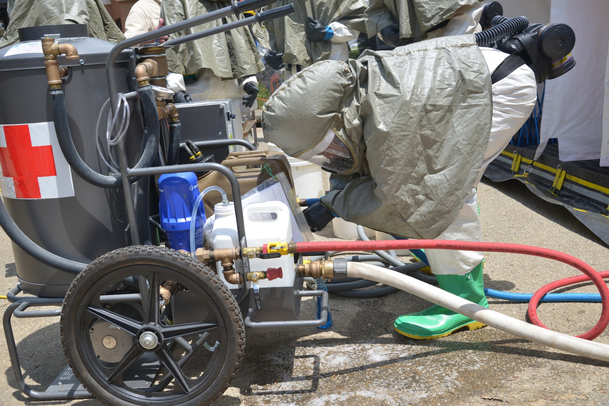 Airmen from the 78th Medical Group recently participated in a three-day, In-Place Patient Decontamination specialized class that included classroom training and hands-on instruction on shelter assembly, setting up a containment system for wastewater runoff and processing, and patient care during a chemical, biological, radiological or nuclear incident. (U.S. Air Force photo by Ray Crayton)