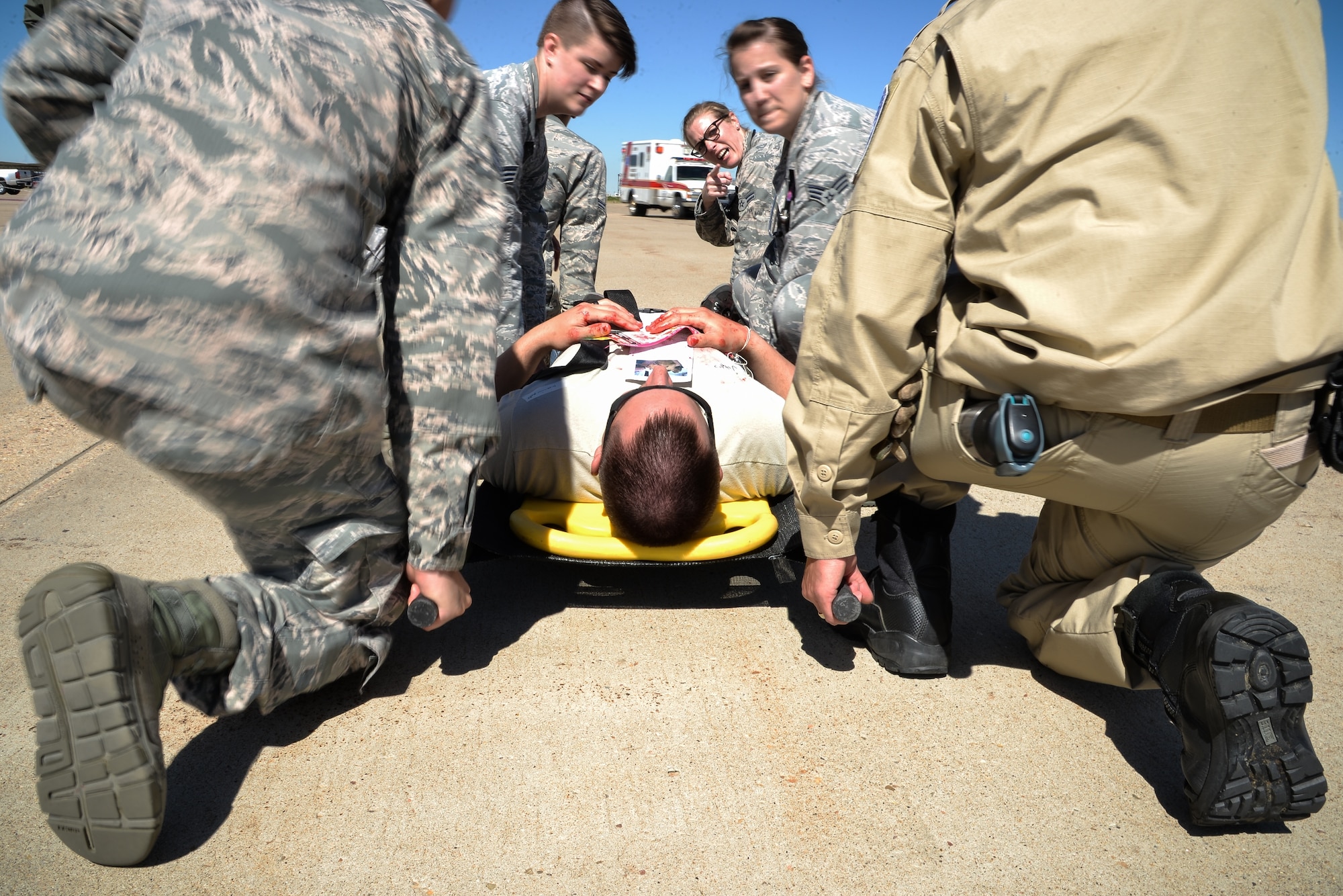 Emergency responders from Hill Air Force Base and the local community participate in a mass casualty exercise at the base, May 18, 2016. The exercise was held in preparation for the Warriors Over The Wasatch open house and air show to be held June 25-26 at Hill AFB.. (U.S. Air Force photo by R. Nial Bradshaw)