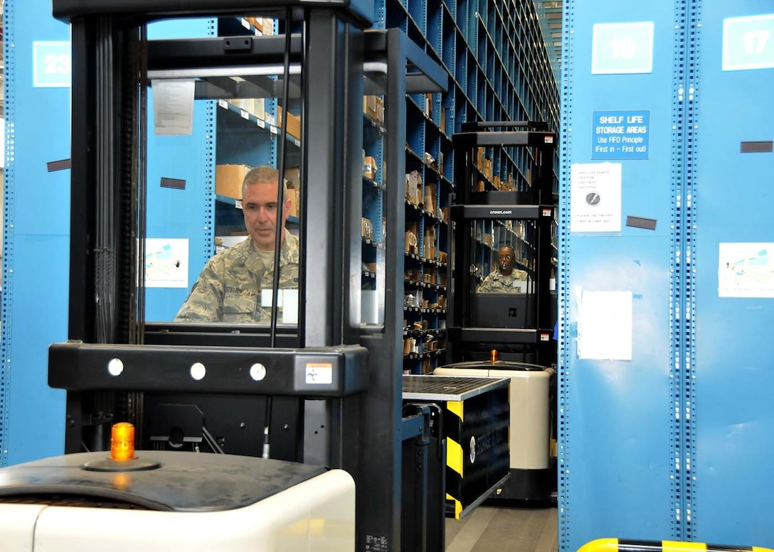 SPANGDAHLEM, Germany - Supply systems analyst, Tech. Sgt. Jackuline Robinson and material management specialist Senior Airman John Severin, train on the hyster forklift, taking supply inventory for the annual inventory inspection, May 17, 2016.  Robinson and Severin are two of approximately 100 Airmen from the 104th Fighter Wing, Barnes Air National Guard Base, Mass.,to deploy to Germany to train side-by-side with their active duty counterparts.  Integration training allows Service Members the opportunity to learn from each other and put that knowledge to use during a combat deployment (U.S. Air National Guard photo by Senior Airman Loni Kingston/Released)