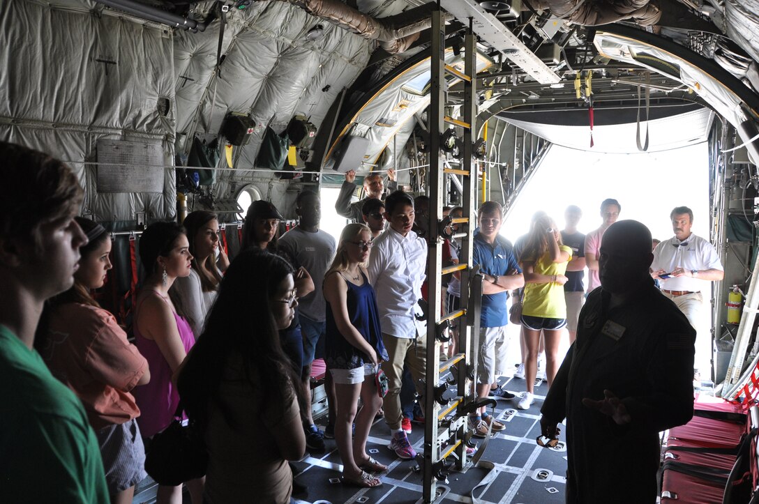 440th Airlift Wing’s Master Sgt. Gregory Benton explains his role as a Load Master and the importance of team work in operating a C-130 to students of Leadership Fayetteville’s youth program, May 12, 2016 at Pope Army Airfield. Leadership Fayetteville’s youth program chooses 2-3 students from local private and public high schools. Each student who applies for the program must have excellent grades and be recommended by their high school counselor. (U.S. Air Force photo by Allison Janssen)
