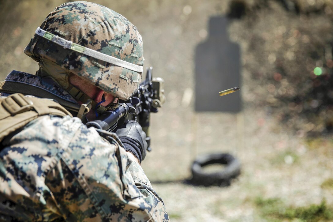 Cpl. Matthew Waltzer fires a round from close range at a target during a combat marksmanship training near Naval Air Station Sigonella, Italy, May 16, 2016. Waltzer is a rifleman with the 1st Battalion, 8th Marine Regiment's Company C. Marine Corps photo by Cpl. Alexander Mitchell