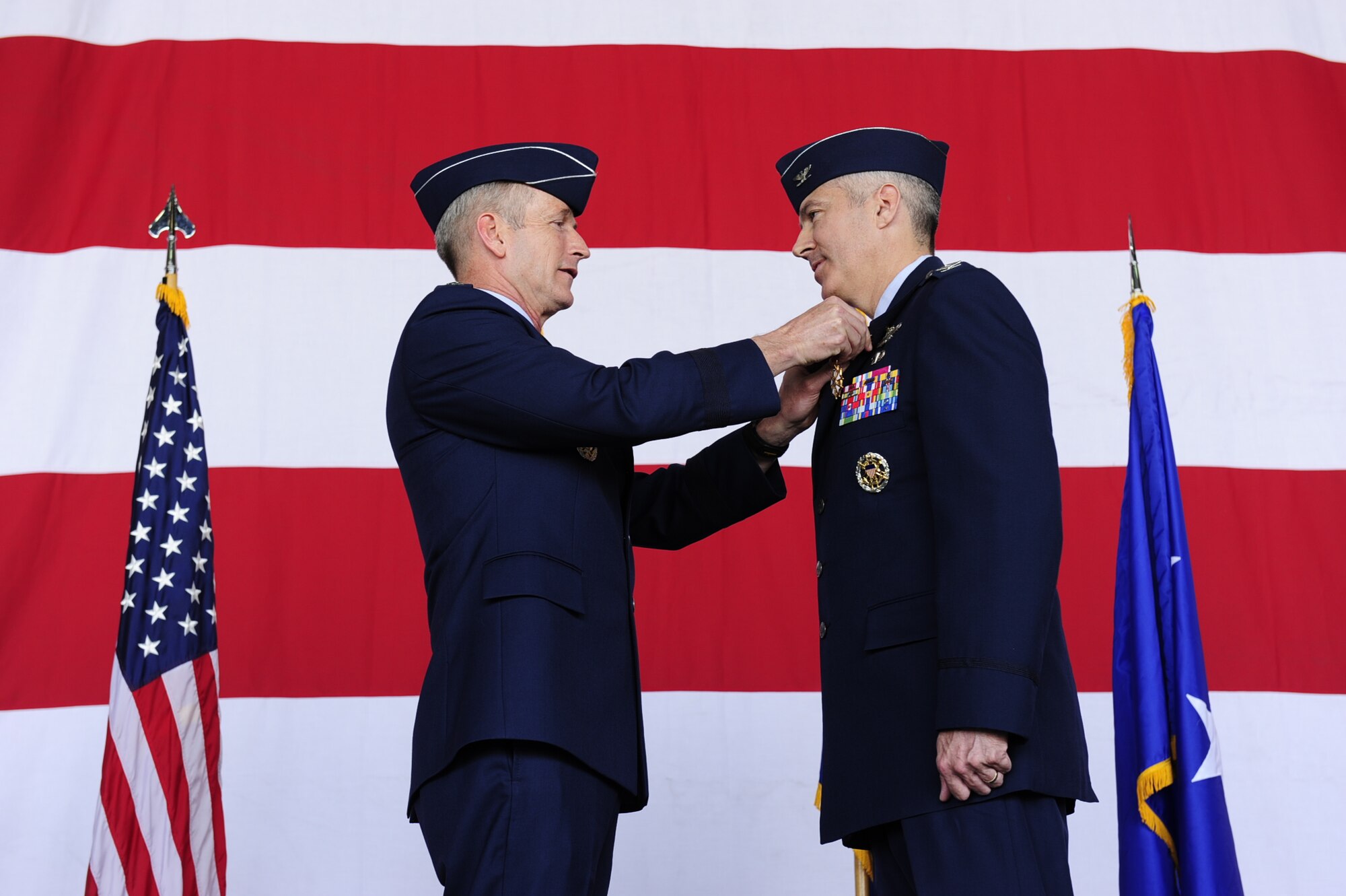 Lt. Gen. Terrence O’Shaughnessy, 7th Air Force commander, awards a Legion of Merit medal to Col. Jeremy Sloane, outgoing 8th Fighter Wing commander on Kunsan Air Base, Republic of Korea, May 20, 2016. (U.S. Air Force photo by Staff Sgt. Chelsea Browning/Released)