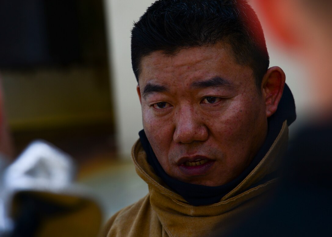 Master Sgt. Hungpyo Rucci, 51st Civil Engineer Squadron fire and emergency services flight assistant chief for health and safety, speaks to his team before live fire training at the Kyonggi-do Fire Academy, Republic of Korea, May 18, 2016. The firefighters were training with their Korean counterparts in their first off-base, live fire training. (U.S. Air Force photo by Senior Airman Victor J. Caputo/Released)