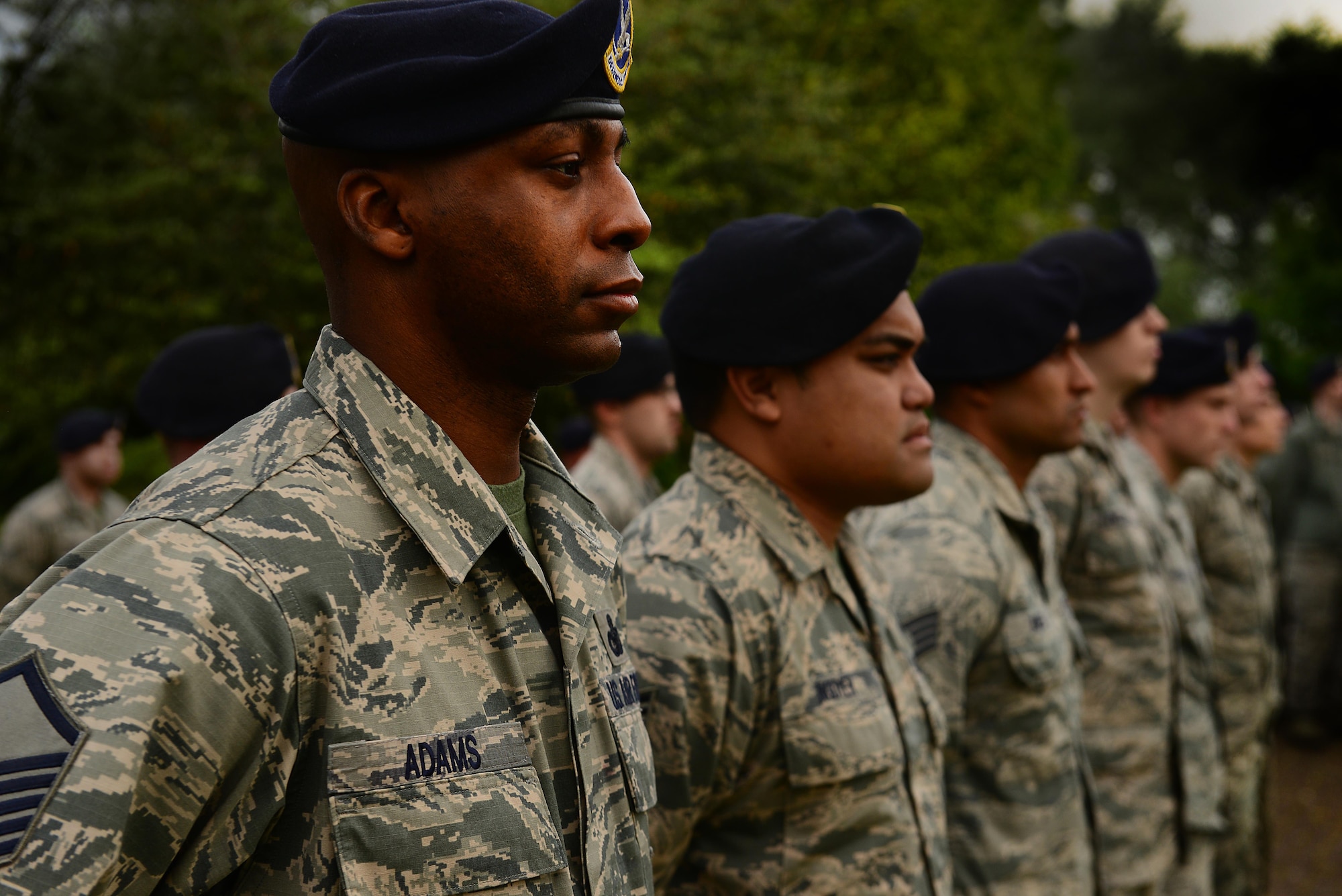 Spartans and Defenders from the 48th and 100th Security Forces Squadrons stand in formation during an opening ceremony kicking off National Police Week at Royal Air Force Lakenheath, England May 13. This year, both Lakenheath and Mildenhall Defenders began the week with a six -mile ruck march, followed by additional events throughout May 16-20. These included a shooting competition, the Defender challenge obstacle course, military working dog competition, community awareness display and closing ceremony. (U.S. Air Force photo/ Tech. Sgt. Matthew Plew)