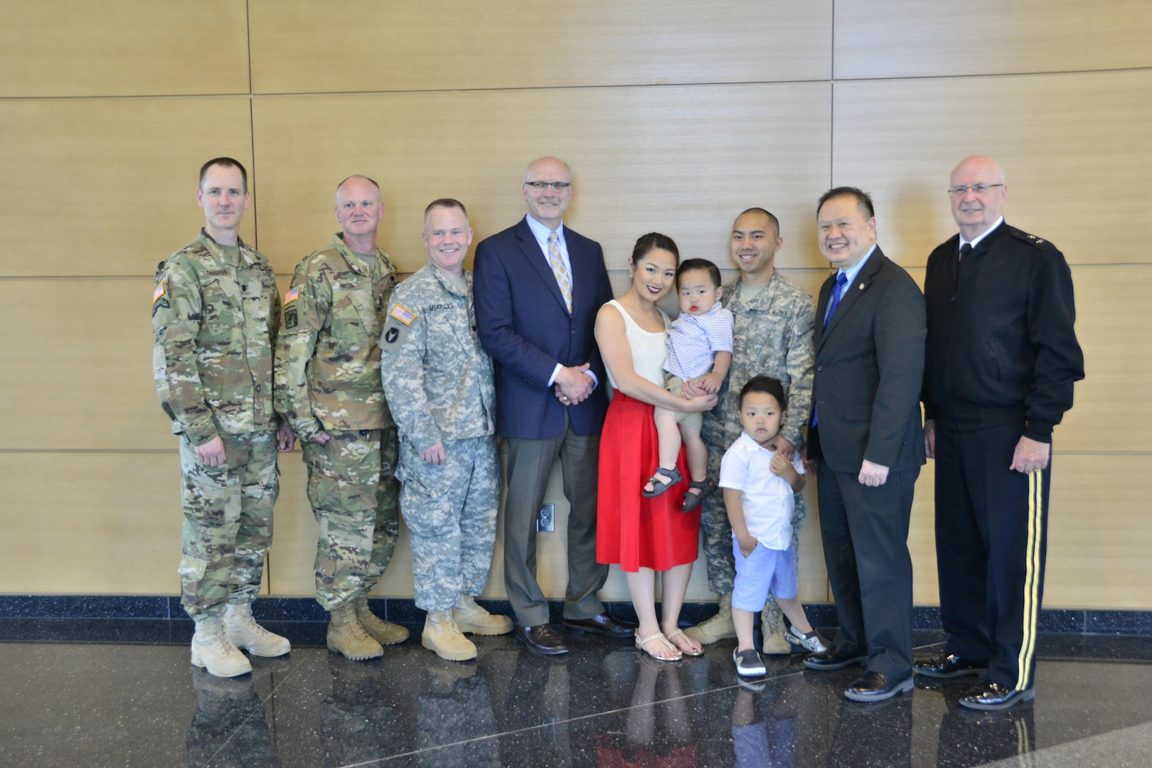 Warrant Officer Candidate Alan Lee meets with Minnesota State Senators Roger Chamberlain and Foung Hawj, May 18, 2016. The Minnesota House and Senate honored Warrant Officer Candidate Alan Lee with resolutions recognizing his leadership in the military and in the community as the advisor for the Minnesota National Guard's Asian American Pacific Islander Heritage Special Emphasis Council. Under Lee's leadership, the council has built and sustained new relationships between the Minnesota National Guard and the communities the council represents.