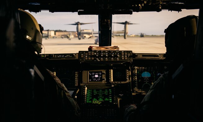 An Air Force and a Marine Corps CV-22 Osprey pilot assigned to the 8th Special Operations Squadron prepare for takeoff during exercise Emerald Warrior 16 on May 12, 2016, at Hurlburt Field, Fla. Emerald Warrior is a U.S. Special Operations Command-sponsored mission rehearsal exercise during which joint special operations forces train to respond to real and emerging worldwide threats. (U.S. Air Force photo/Senior Airman Jordan Castelan)