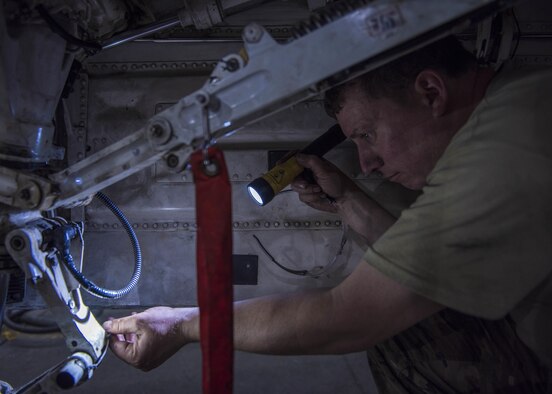 Tech. Sgt. Christopher Melrose, a 455th Expeditionary Aircraft Maintenance Squadron phase technician, inspects the interior of an F-16C Fighting Falcon during routine phase maintenance at Bagram Airfield, Afghanistan, May 18, 2016. The aircraft went through phase maintenance where members of the 455th EAMS phase flight closely inspected the aircraft for cracks and other types of damage, verifying that the 30-plus year old aircraft was safe to fly. (U.S. Air Force photo/Senior Airman Justyn M. Freeman)