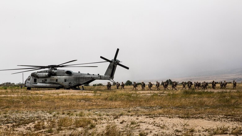 Marines with the Maritime Raid Force board a CH-53E Super Stallion before an air insert into a reconnaissance and surveillance mission during a Marine Expeditionary Unit field exercise at Marine Corps Base Camp Pendleton, Calif., May 12, 2016. The reconnaissance Marines with the MRF are trained in a number of insertion methods to fulfil a wide variety of mission requirements and may insert through land, sea and air depending on the mission. 