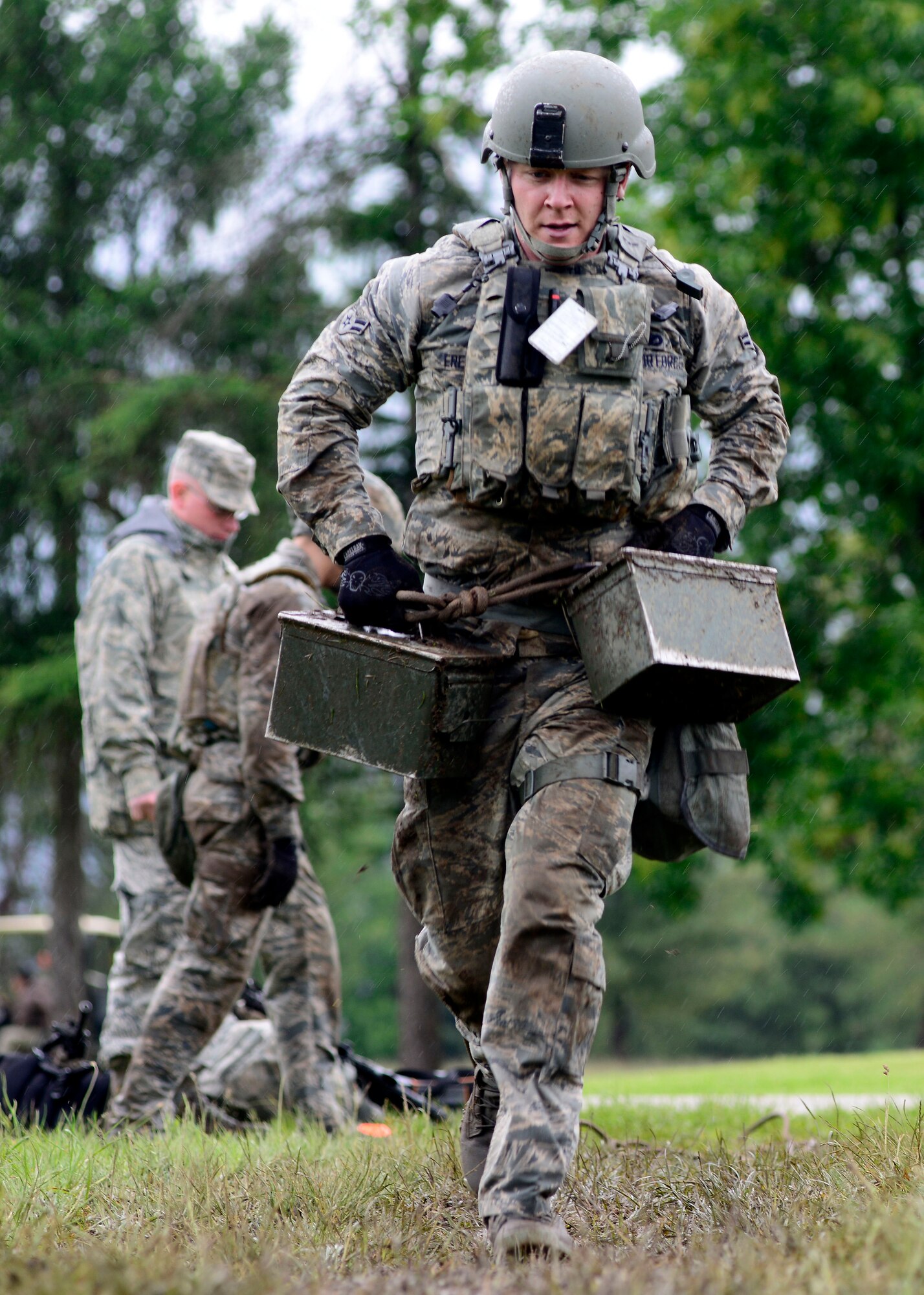 Airman 1st Class Nicholas Ereth, 31st Security Forces Squadron security forces team member, carries weighted ammunition canisters during the Police Week Fire Team Challenge, May 19, 2016, at Aviano Air Base, Italy. During the week, ceremonies, a memorial and other events took place to honor the men and women who have served in the line of duty. (U.S. Air Force photo by Senior Airman Areca T. Bell/Released)