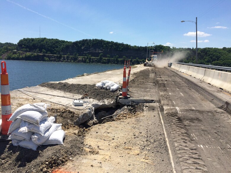 This photo taken May 19, 2016 shows surface drainage erosion found during a road restoration project on Highway 127 over Wolf Creek Dam, which contractors discovered at the edge of the roadway.    The Corps’ engineers have been on site since then to determine the most efficient and timely solution in order to reduce the extended lane closures currently in effect for the project.