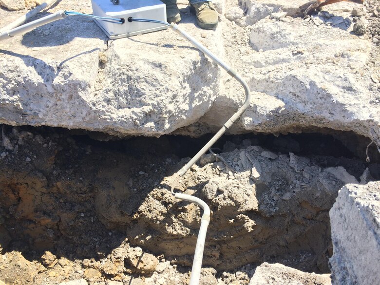 This photo taken May 19, 2016 shows surface drainage erosion found during a road restoration project on Highway 127 over Wolf Creek Dam, which contractors discovered at the edge of the roadway.    The Corps’ engineers have been on site since then to determine the most efficient and timely solution in order to reduce the extended lane closures currently in effect for the project.