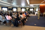 Army Col. Ronnie Davis speaks to the crowd just after taking command of the Defense Logistics Agency’s Army Reserve Element May 15 at a change of command ceremony at the McNamara Headquarters Complex, Fort Belvoir, Virginia.