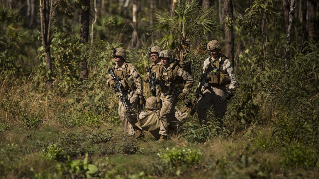 U.S. Marines move a simulated casualty onto a landing zone outside of Robertson Barracks, Northern Territory, Australia, May 20, 2016. Marines with Marine Rotational Force - Darwin simulated causality evacuations with a UH-1Y Venom helicopter. 