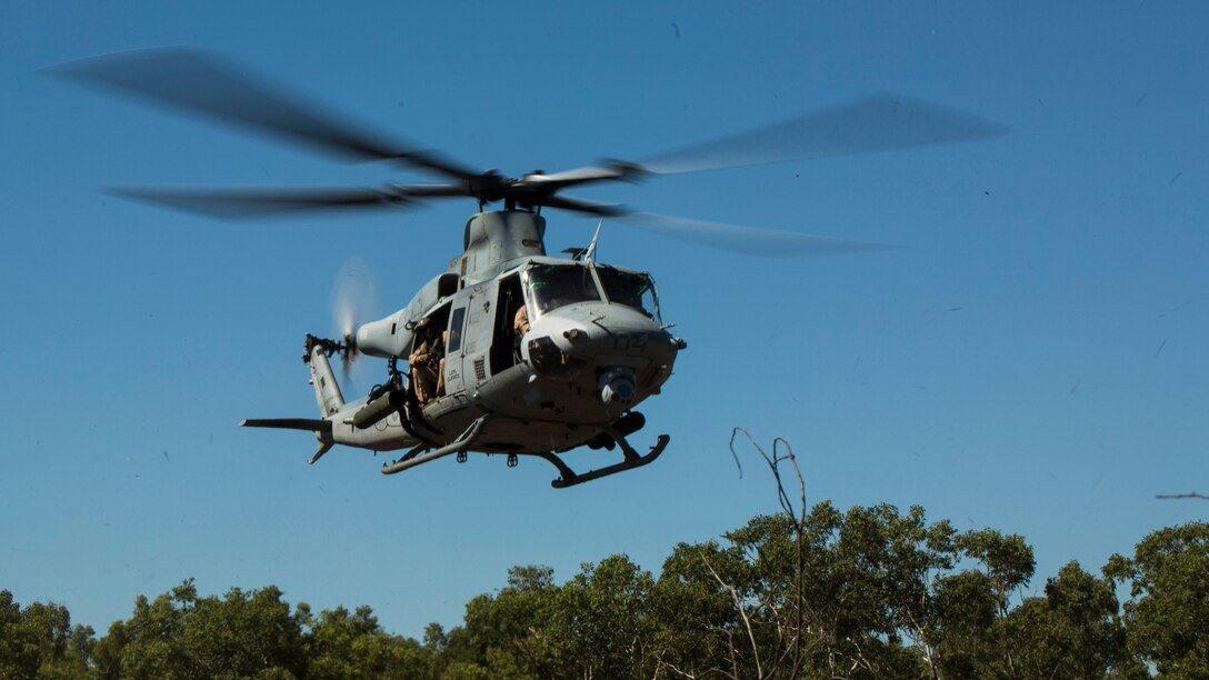 A UH-1Y Venom helicopter hovers above a landing zone outside of Robertson Barracks, Northern Territory, Australia, May 20, 2016. Marines with Marine Rotational Force - Darwin simulated causality evacuations with a UH-1Y Venom helicopter. MRF-D is a six-month deployment of Marines into Darwin, Australia, training in a new environment. The Marines are with Marine Light Attack Helicopter Squadron 367, MRF-D.