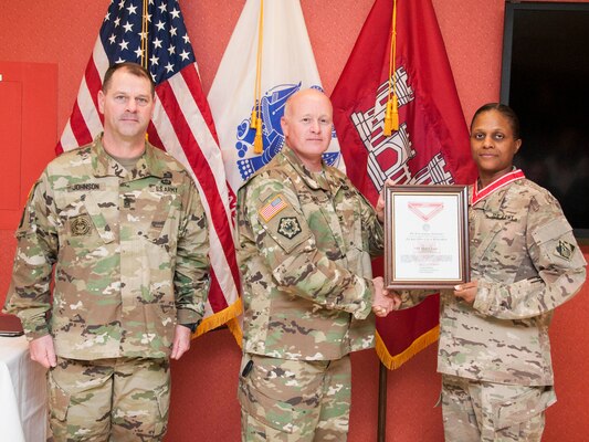U.S. Army Corps of Engineers, Transatlantic Division leaders presented the Steel order of the deFleury Medal to Capt. Alicia Luces, a project manager with the Middle East District, in an award ceremony April 21.