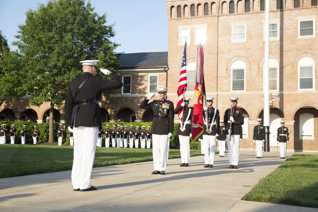 From left to right, Gen. John M. Paxton, assistant commandant of the Marine Corps, and Lt. Gen. Robert E. Schmidle salute during his retirement ceremony at Marine Barracks Washington, D.C., May 19, 2016. Schmidle was appointed as the Principle Director of Cost Assessment and Program Evaluations, Office of the Secretary of Defense in March of 2014, where he was responsible for analyzing and evaluating plans, programs and budgets in relation to U.S. defense objectives. (Official Marine Corps photo by Cpl. Chi Nguyen/Released)