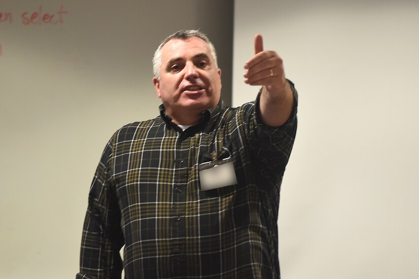 Larry Frady, physical security inspector for the 88th Regional Support Command, discusses the importance of ensuring all sensitive items are accounted for and secured properly. 
(U.S. Army photo by Sgt. Aaron Berogan/Released)