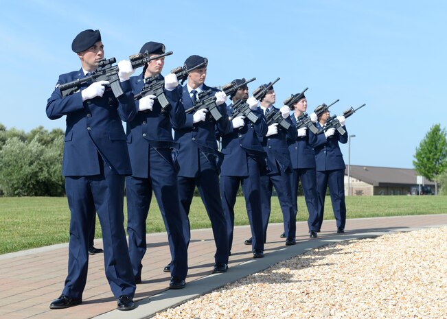 Members of the 9th Security Forces Squadron conduct a 21-gun salute during a memorial ceremony for National Police Week honoring fallen Security Forces Airmen and Air Force Office of Special Investigation members May 19, 2016, at Beale Air Force, California. (U.S. Air Force photo by Senior Airman Ramon A. Adelan)