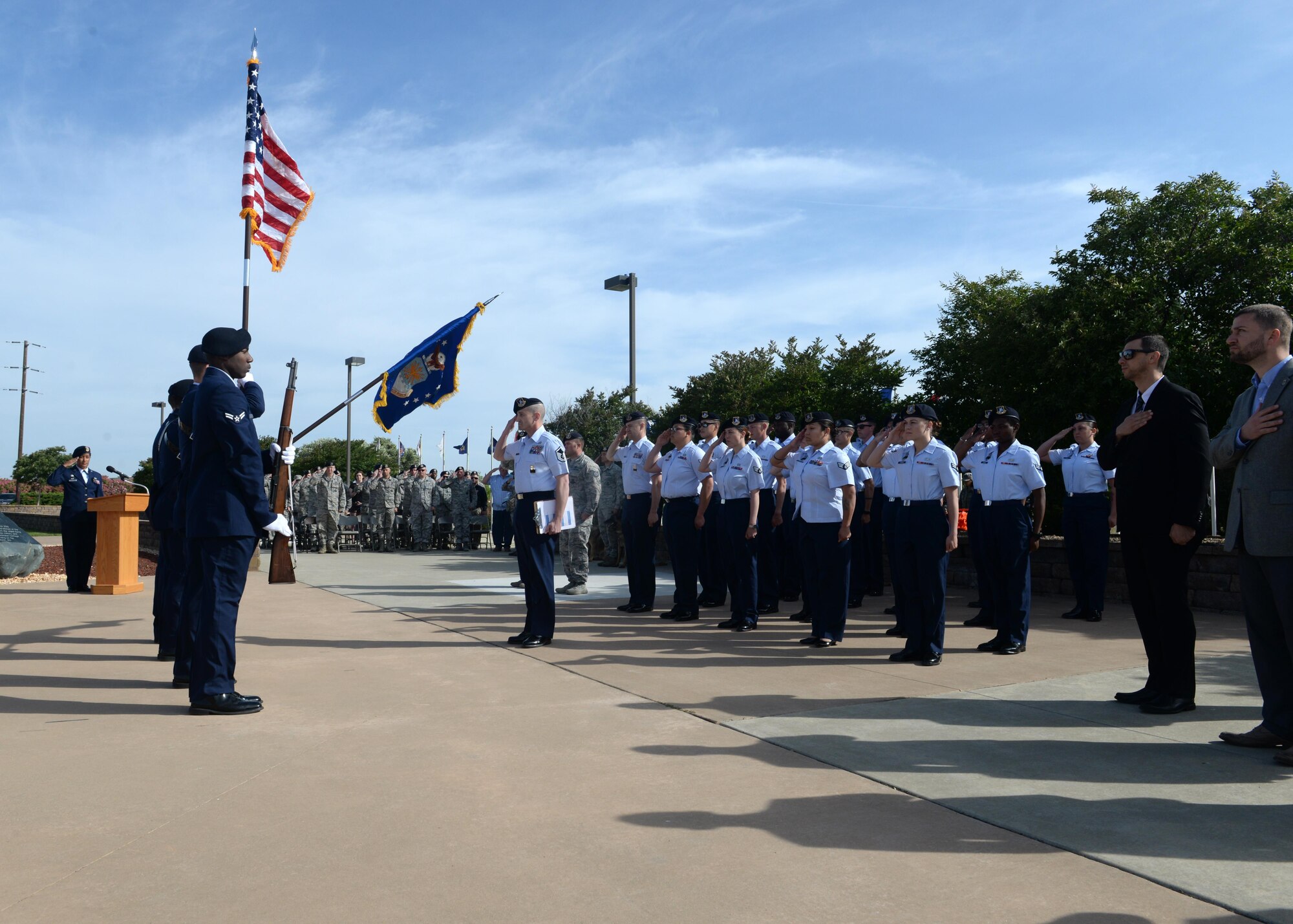 Members of the 9th Security Forces Squadron present the colors during a memorial ceremony for National Police Week honoring fallen Security Forces Airmen and Air Force Office of Special Investigation members May 19, 2016, at Beale Air Force, California. (U.S. Air Force photo/ Senior Airman Ramon A. Adelan)