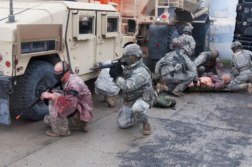 Army engineer Soldiers compete in the Sapper Stakes 2016 by clearing a building and evacuating an injured member of their group during the competition at Fort Drum, New York, May 14.