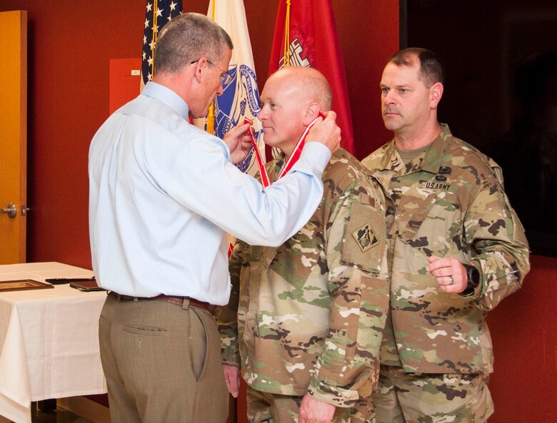 U.S. Army Corps of Engineers, Transatlantic Division leaders presented the Bronze order of the deFleury Medal to Col. Stephen F. Dale in an award ceremony April 21.