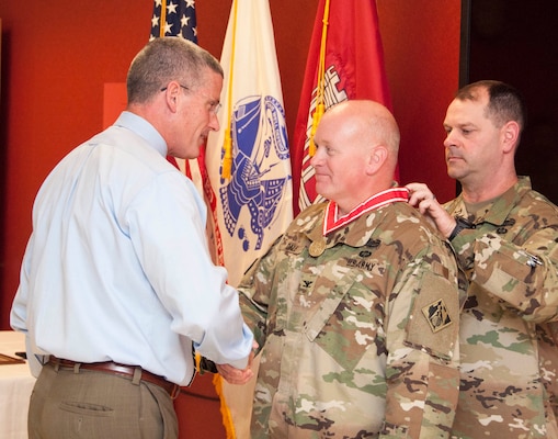 U.S. Army Corps of Engineers, Transatlantic Division leaders presented the Bronze order of the deFleury Medal to Col. Stephen F. Dale in an award ceremony April 21.