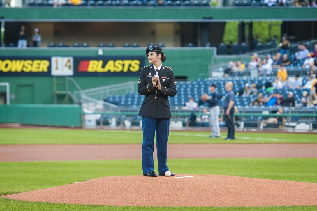 Private 1st. Class Kristyn Howell, an information technology specialist with the 316th Sustainment Command (Expeditionary), prepares to meet and great players of the Pittsburgh Pirates baseball team at PNC Park in Pittsburgh, Pa., May 19, 2016. The Pirates hosted the first Military Takes the Field night at PNC Park to honor members of all branches of the military (U.S. Army photo by Staff Sgt. Dalton Smith/Released)