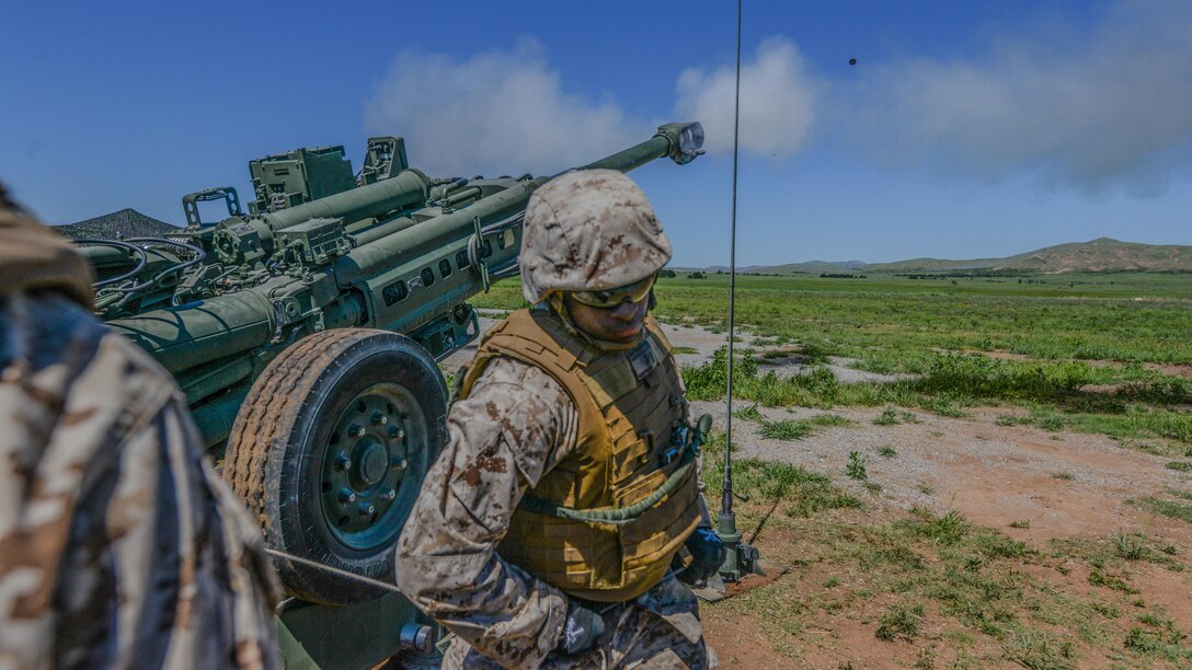 Second Lt. Jamal Campbell pulls the line on a M777A2 Howitzer at the Field Artillery Basic Officers Leadership Course at Fort Sill, Oklahoma, May 12, 2016. Marine officers spend five months at the school learning how to lead their Marines in the artillery field. 