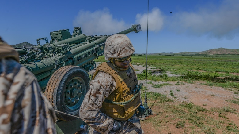 Second Lt. Jamal Campbell pulls the line on a M777A2 Howitzer at the Field Artillery Basic Officers Leadership Course at Fort Sill, Oklahoma, May 12, 2016. Marine officers spend five months at the school learning how to lead their Marines in the artillery field. 