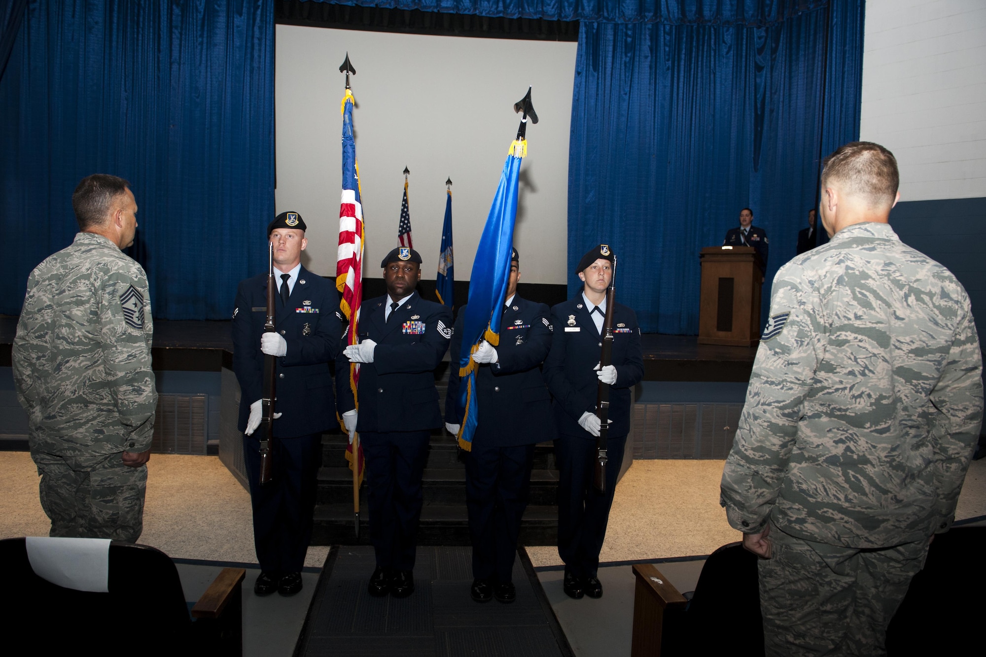 U.S. Air Force Airmen from the 23d Security Forces Squadron present the colors during a retreat ceremony, May 20, 2016, at Moody Air Force Base, Ga. The ceremony was held to honor and remember the lives of fallen Security Forces Airmen as well as law enforcement officers in the local area. (U.S. Air Force photo by Airman 1st Class Lauren M. Hunter/Released)