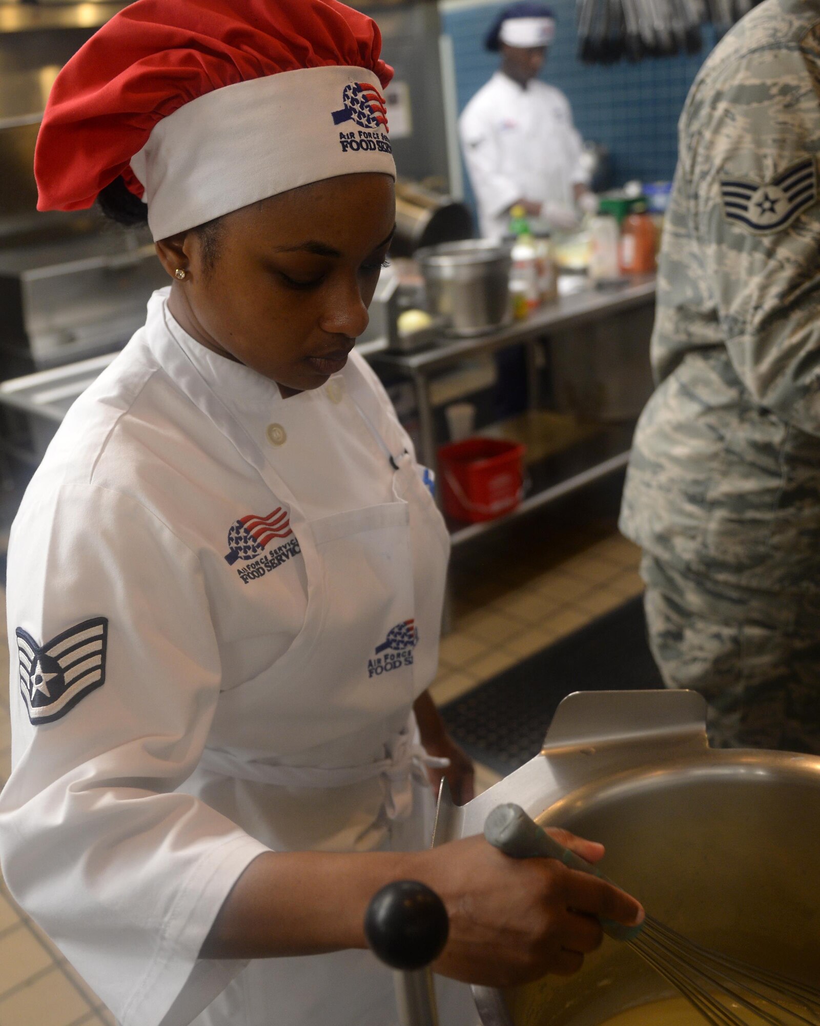 Staff Sgt. Jacquelyne Ford, 325th Force Support Squadron Berg-Liles Dining Facility (DFAC) shift leader, stirs a pot of broth being prepared for the dinner crowd at Tyndall Air Force Base, May 17. The DFAC provides hot, nutritious food service to more than 62,000 personnel annually in support of the Tyndall mission to train and project unrivaled combat air power. (U.S. Air Force photo by Airman 1st Class Cody R. Miller/Released)