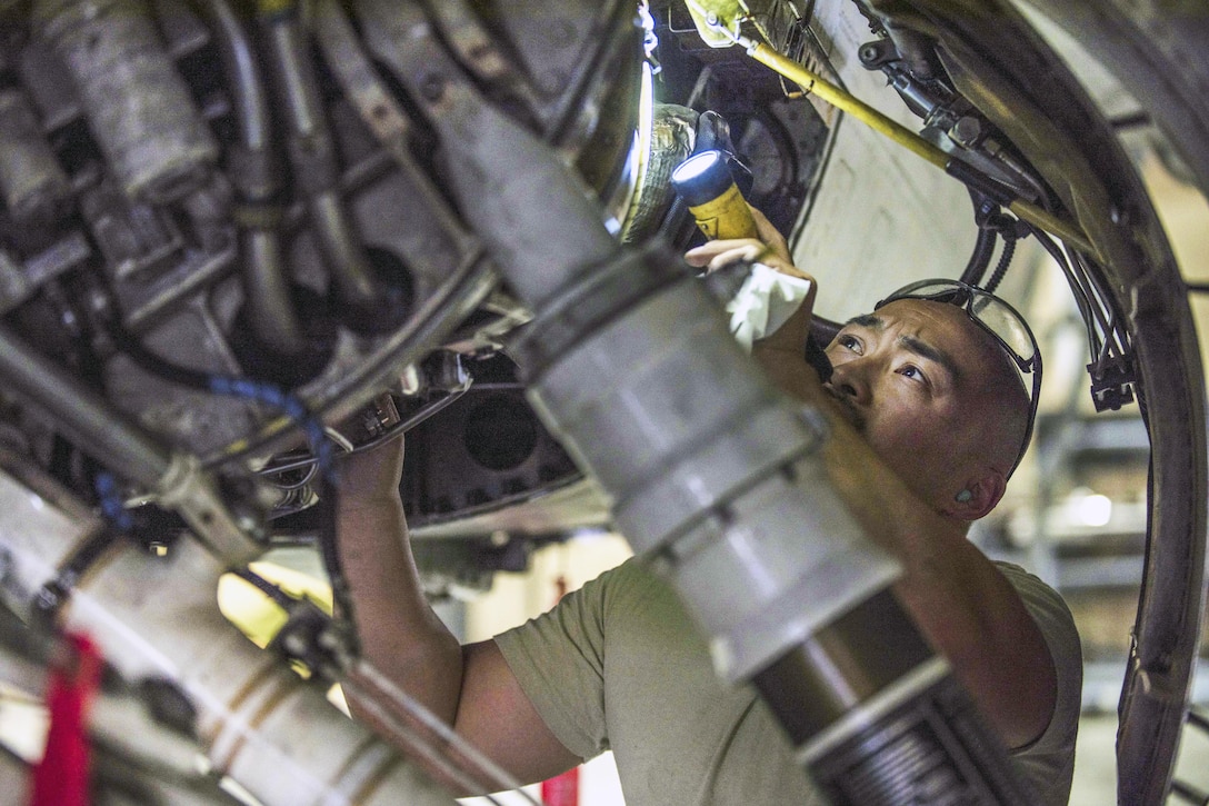 Air Force Technical Sgt. Rene Garcia inspects the interior of an F-16C Fighting Falcon during routine phase maintenance at Bagram Airfield, Afghanistan, May 18, 2016. The aircraft, which is more than 30 years old, is undergoing phase maintenance in which airmen inspect for cracks and other damage. Garcia is assigned to the 455th Expeditionary Unit. Air Force photo by Senior Airman Justyn M. Freeman

